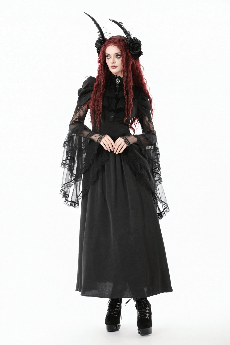 Full-body side shot of black gothic lace dress on model highlighting bell-sleeve drape and floor-length maxi silhouette