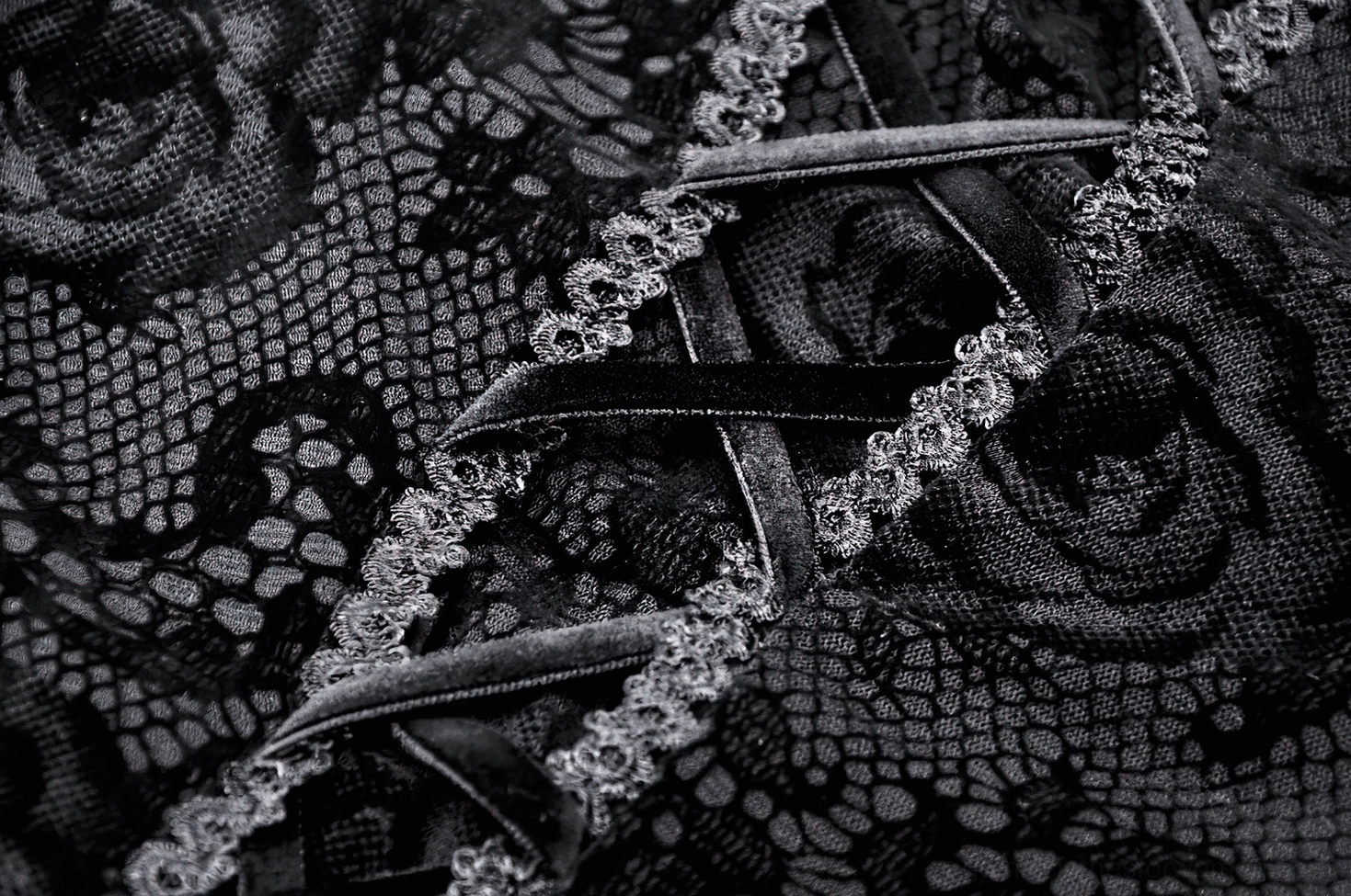 Black gothic lace mermaid dress styled with gothic accessories and dark aesthetics for alternative fashion presentation