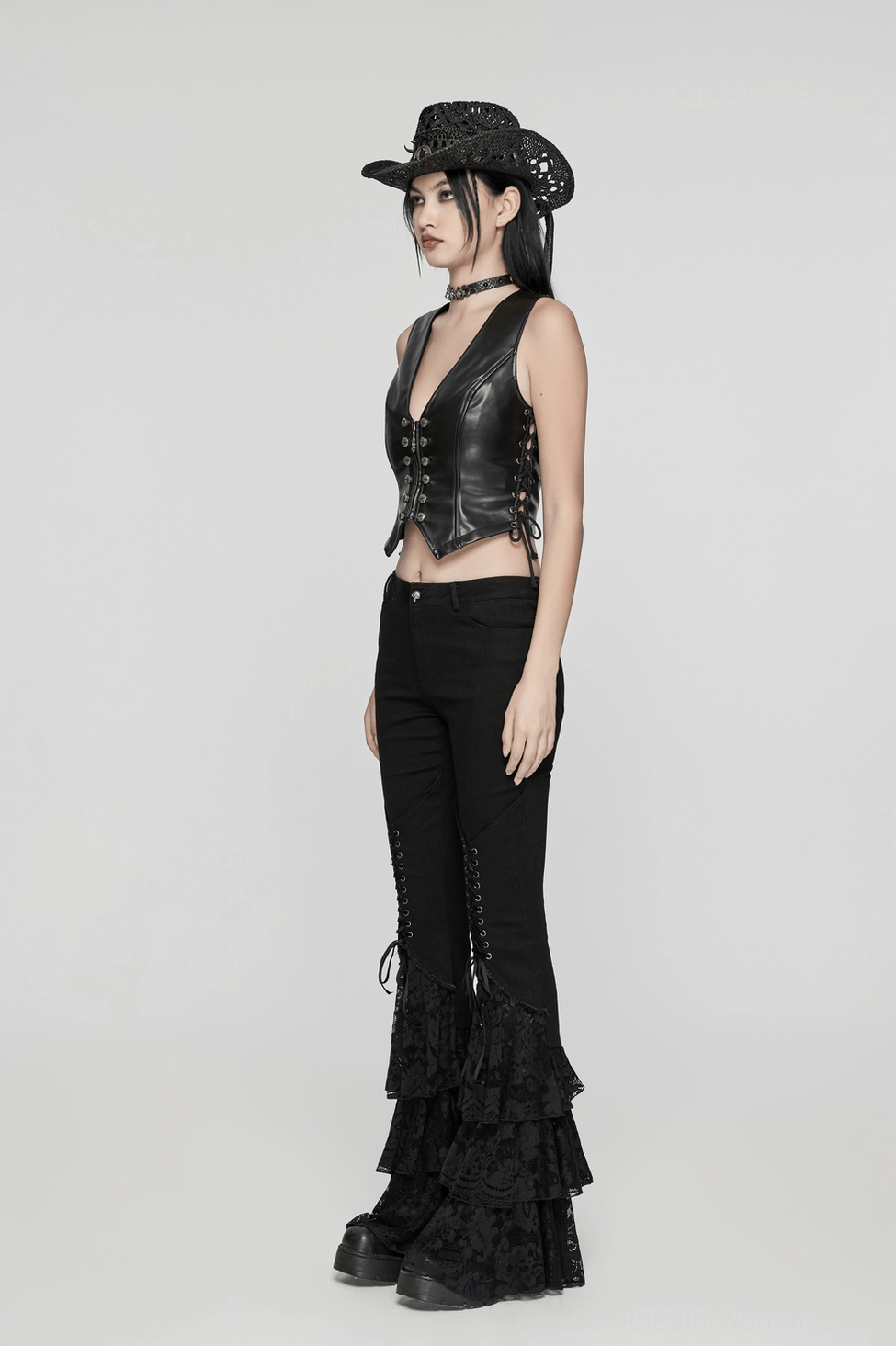 Black gothic lace flared pants showing overall slim-fit silhouette with dramatic lace flare proportions