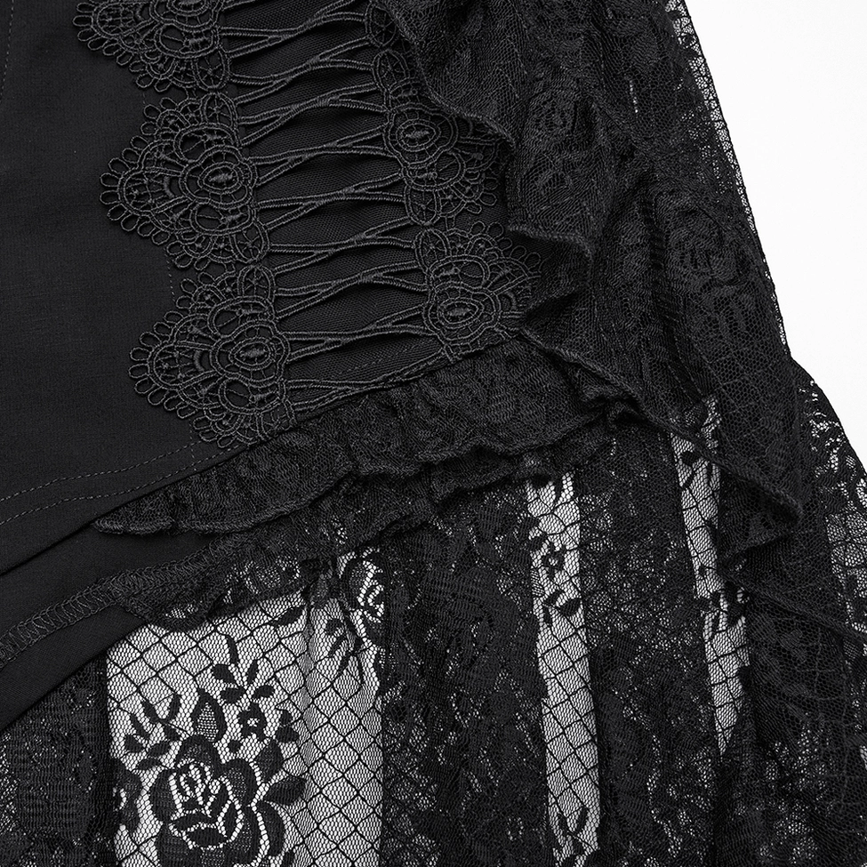 Close-up detail of black gothic lace shorts - braided lace trim and ruffled edge texture