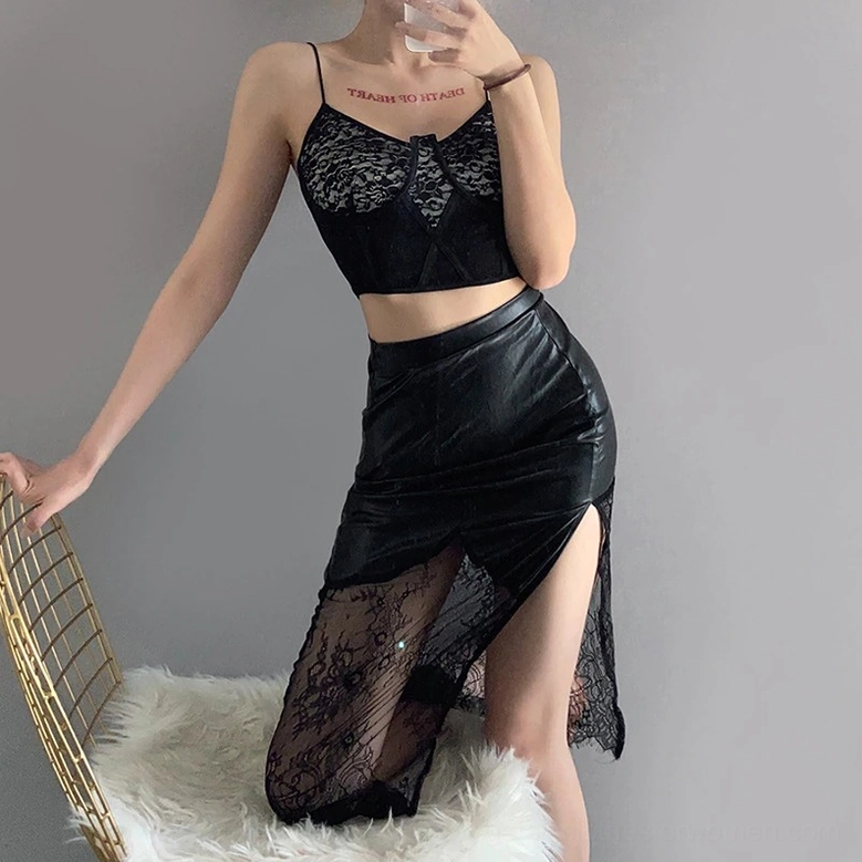 Black gothic lace midi skirt three-quarter front view on model, high waist empire silhouette with sheer lace details