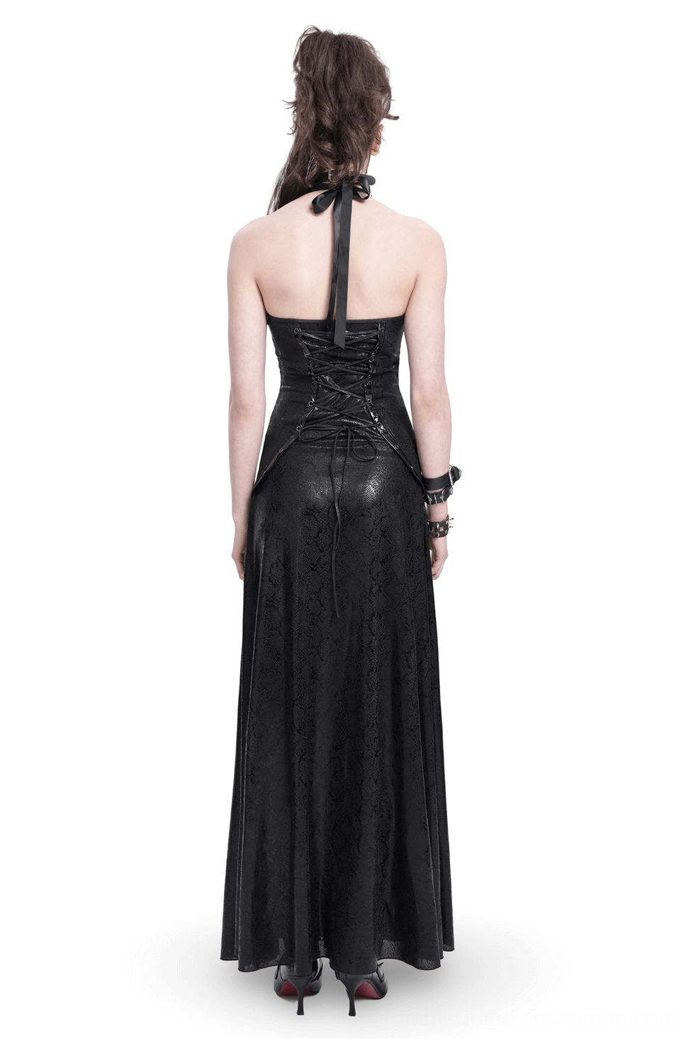 Back view of black gothic lace-up corset maxi dress with halter tie straps and adjustable lacing on female model