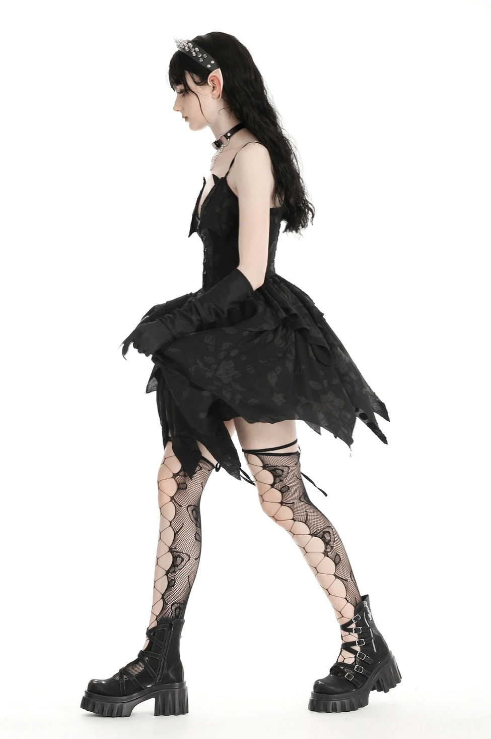 Black gothic lace-up dress side angle view displaying ruffled layers and corset bodice depth