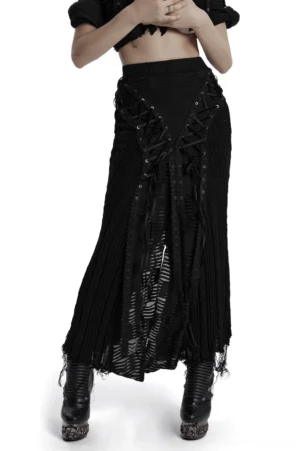 Black distressed gothic lace-up knit maxi skirt front three-quarter view with asymmetric frayed hem and lace-up details on female model