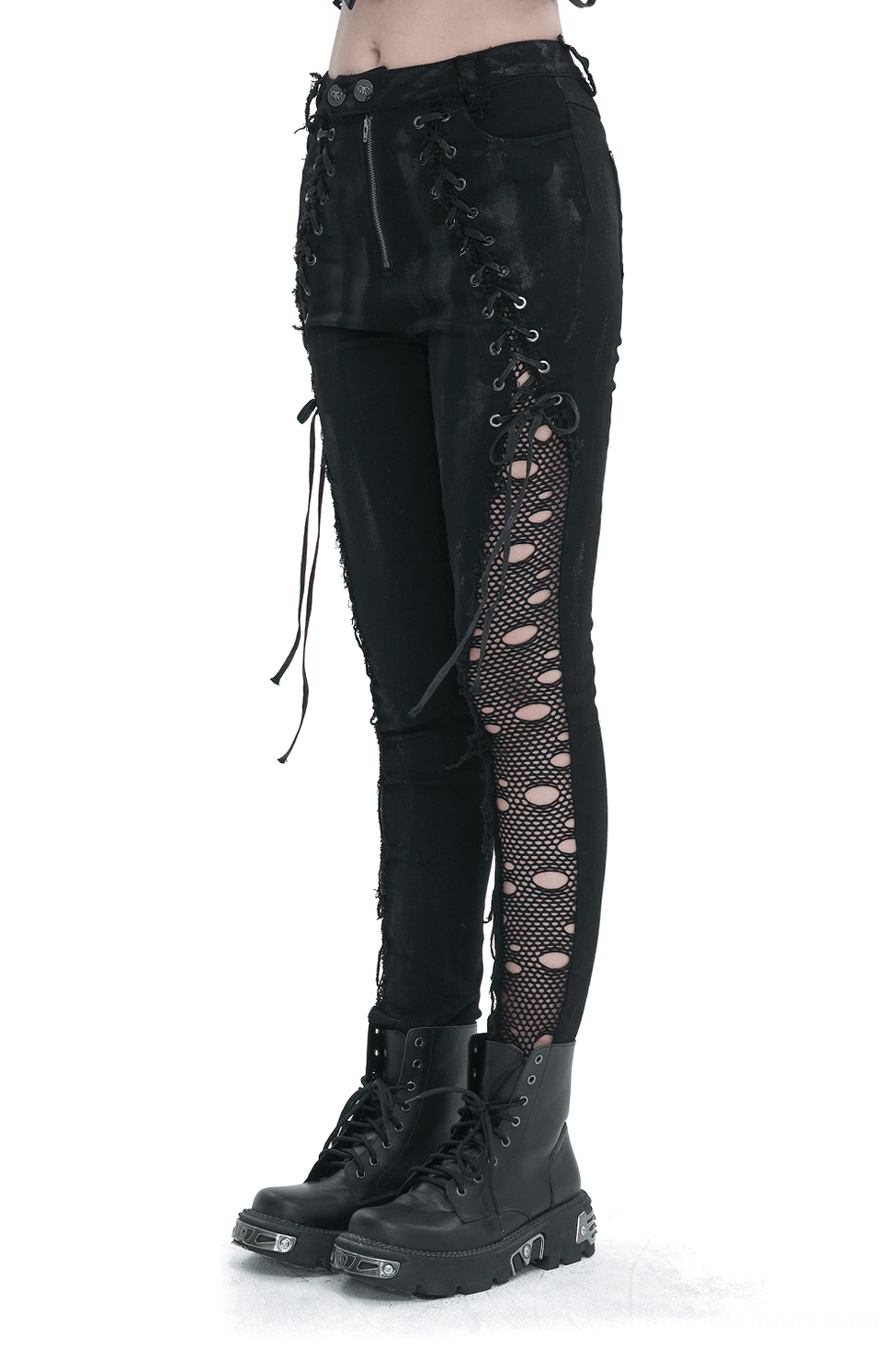 Black gothic lace-up punk trousers with fishnet side panels worn on model, side view showing symmetrical lace-up details and metal eyelets