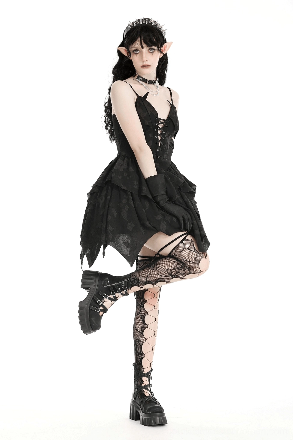 Black gothic lace-up ruffled dress detail shot emphasizing corset bodice structure and layered skirt design