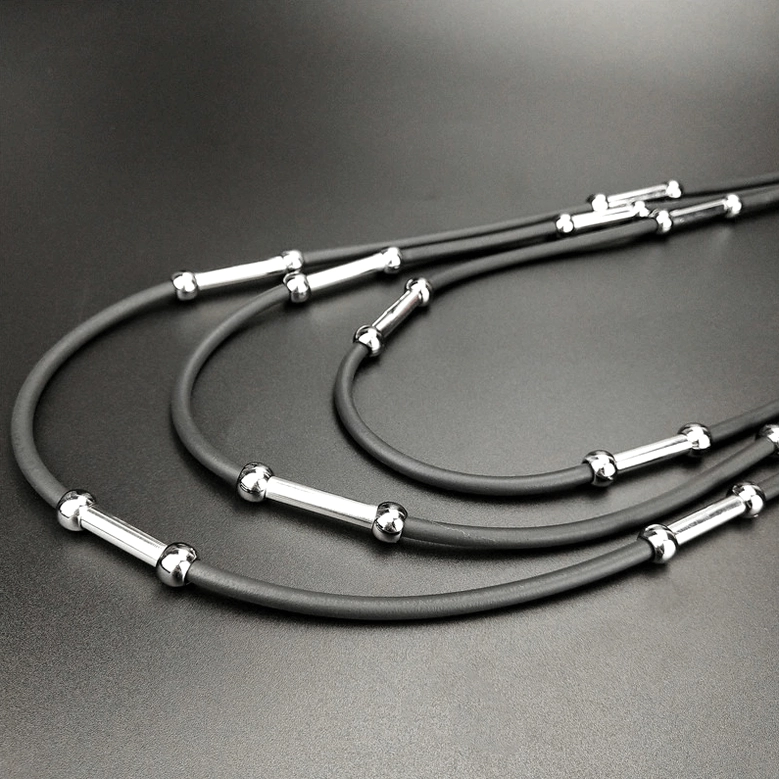 Black gothic layered rope necklace handmade with adjustable elastic strands and metal accents