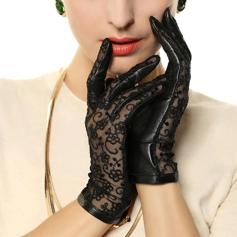 Black gothic leather and lace gloves with floral embroidery, wrist-length Victorian style, close-up front view showcasing lace detail