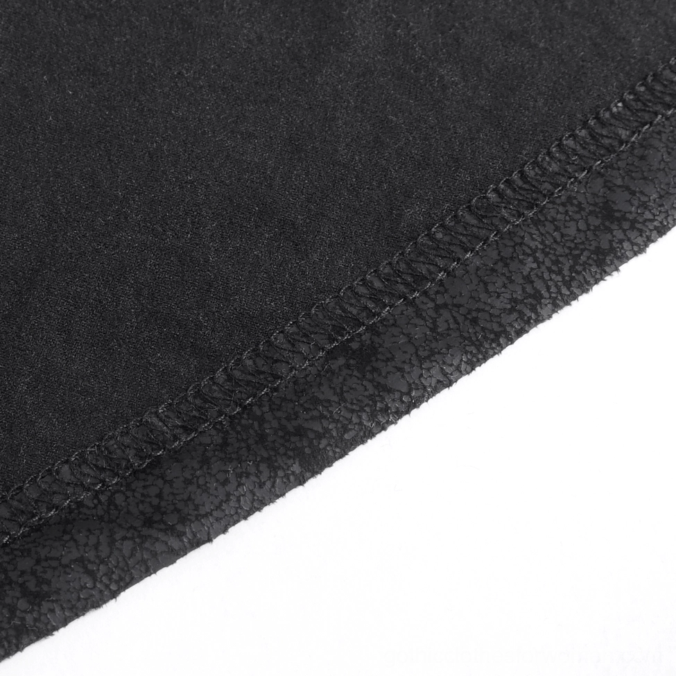 Black faux leather gothic skirt detail shot revealing the sophisticated cracked leather texture and premium construction of the buckled maxi silhouette