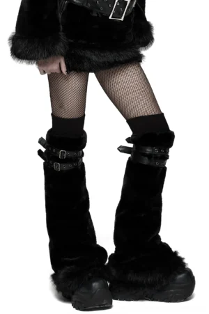 Black faux fur leg warmers with adjustable buckle straps worn with fishnet tights and platform boots - front view