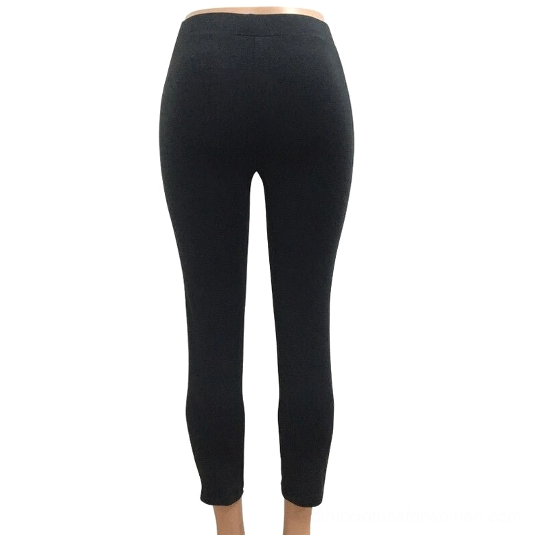 Solid black high-waisted gothic leggings, ankle length, back view flat lay