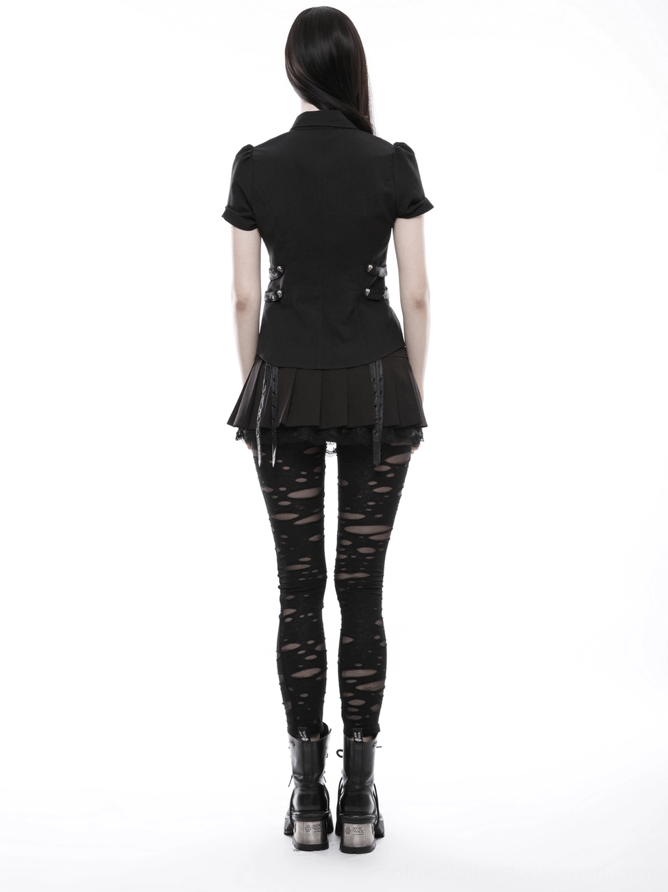 Black distressed gothic leggings styled back full-body view with black top and ankle boots