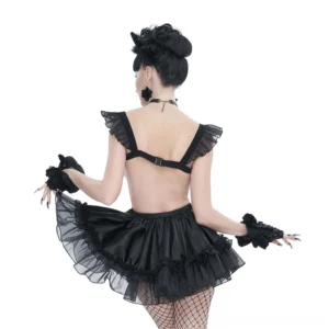 Black gothic lingerie dress back view showing backless design, tiered ruffled mini skirt, and adjustable back strap on female model with cat ears