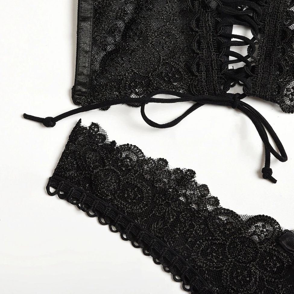 Black gothic lace lingerie ensemble showing bra and matching thong panty together