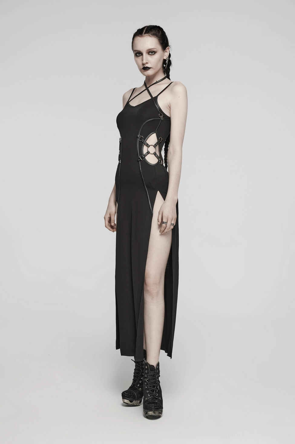 Black gothic maxi dress styling shot with layered accessories and alternative fashion aesthetic