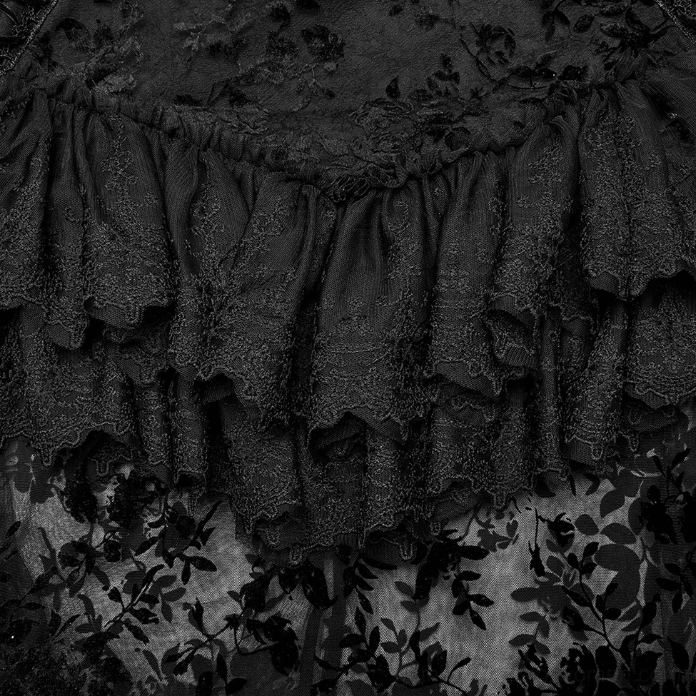 Close-up detail of black gothic maxi skirt's layered lace ruffles and floral sheer mesh base texture
