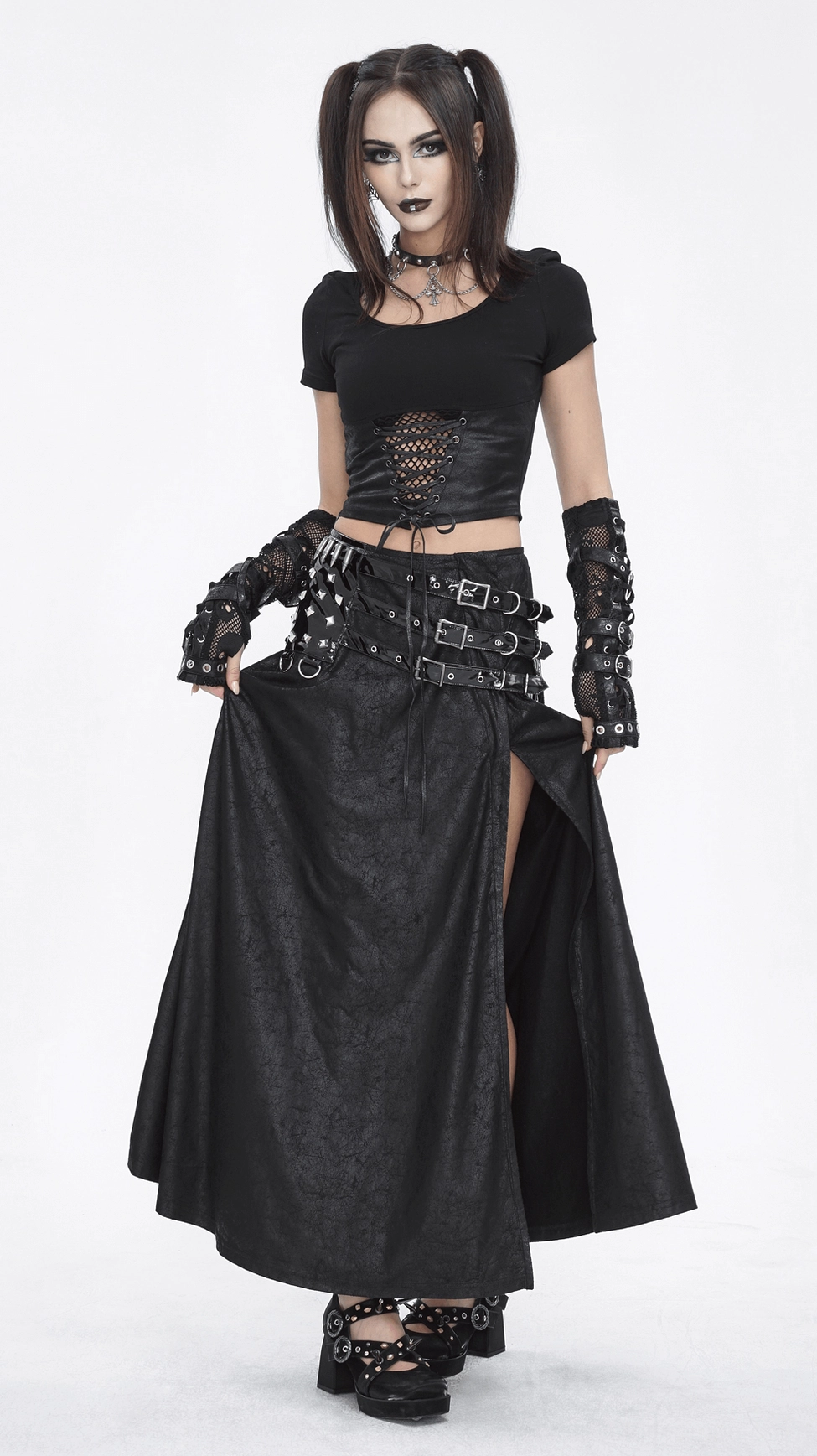 Black faux leather gothic maxi skirt highlighting the functional yet decorative lace-up back panel and the edgy buckle strap waist design