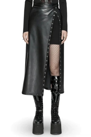 Black faux leather gothic maxi skirt with metal eyelet diagonal slit, front three-quarter view on model