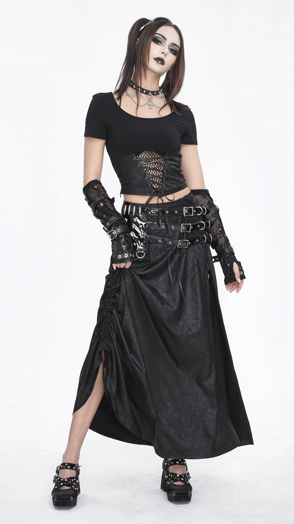 Black gothic buckled maxi skirt detail highlighting the premium synthetic leather construction and industrial metal hardware that define modern goth fashion
