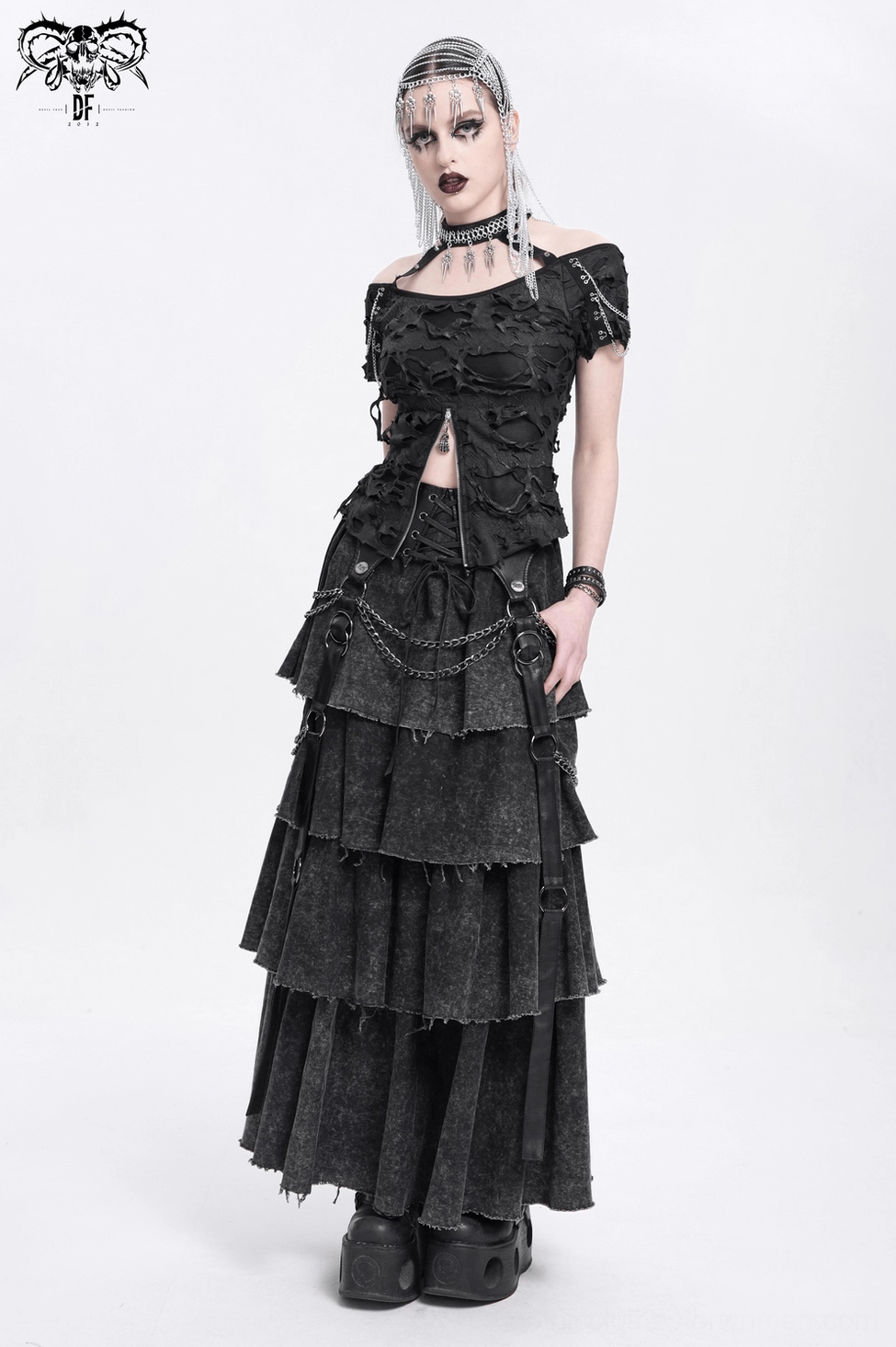 Black gothic skirt three-quarter angle view showcasing layered construction and chain accents from side perspective