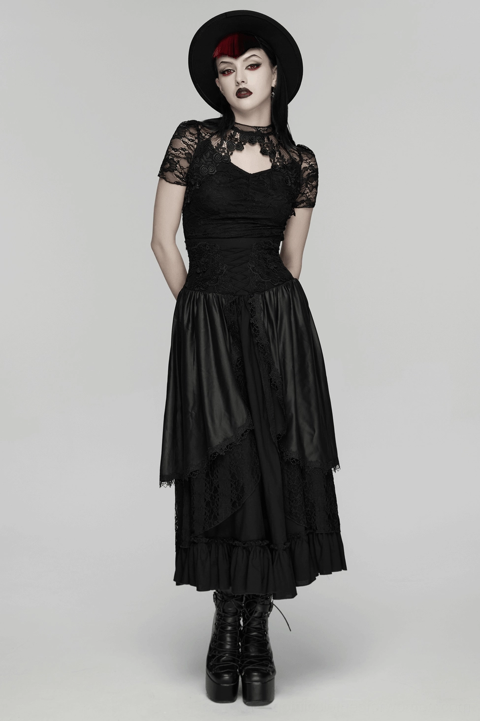 Black gothic maxi skirt styled detail showing waist silhouette and layered skirt movement