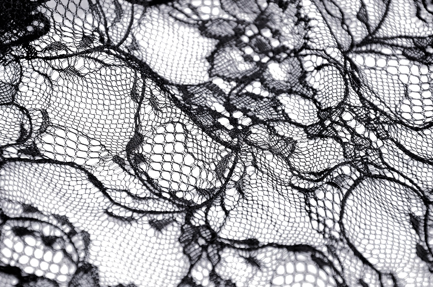 Black lace mermaid skirt styled detail shot highlighting corset back lacing and Victorian gothic aesthetic
