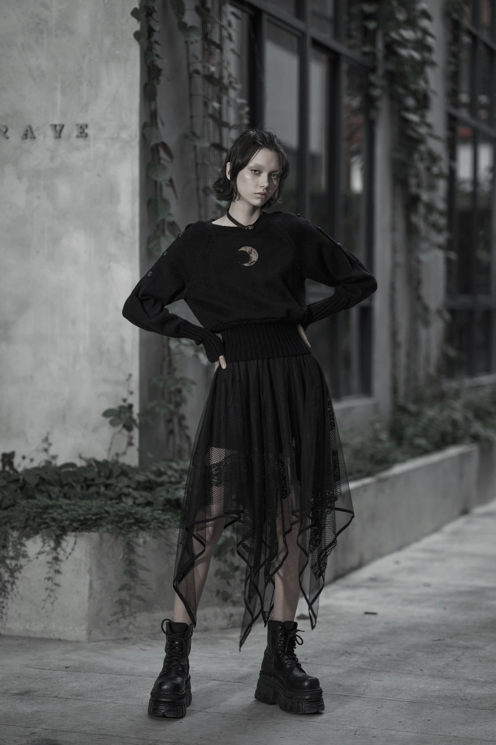 Black gothic mesh and lace skirt detail view showing design elements and fabric layers