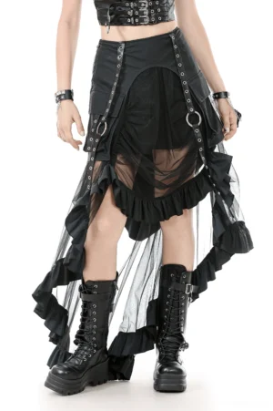 Black asymmetrical high-low gothic skirt with layered mesh and metal O-ring hardware, front three-quarter view on model