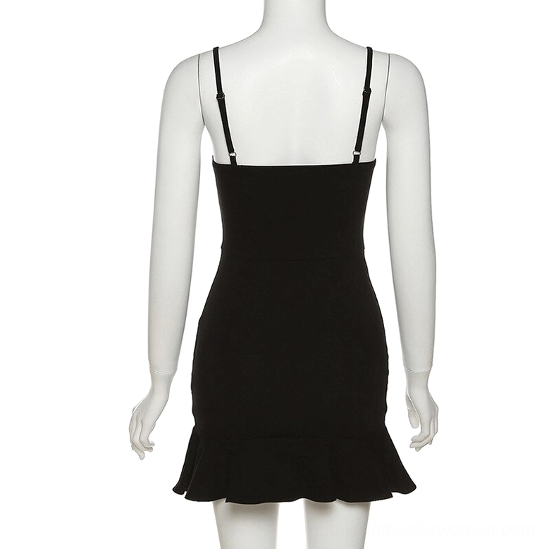 Black gothic mini dress back view on mannequin, spaghetti straps and fitted silhouette with ruffled hem