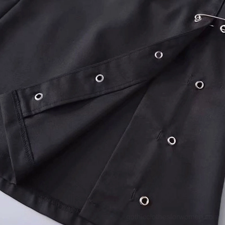 Black gothic safety pin mini skirt showing silhouette and a-line construction detail