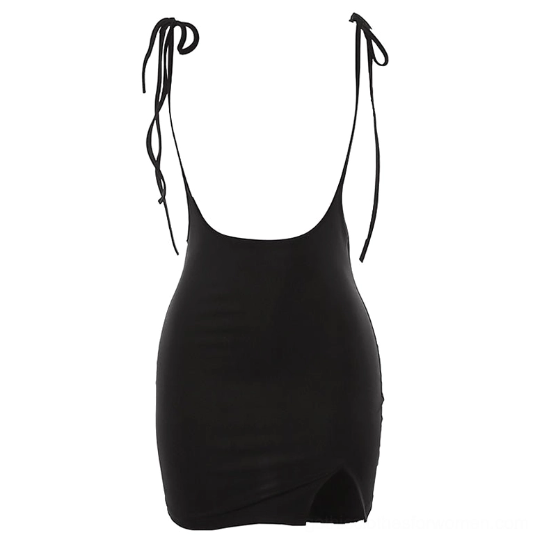 Black gothic mini skirt with tie shoulder straps flat lay display