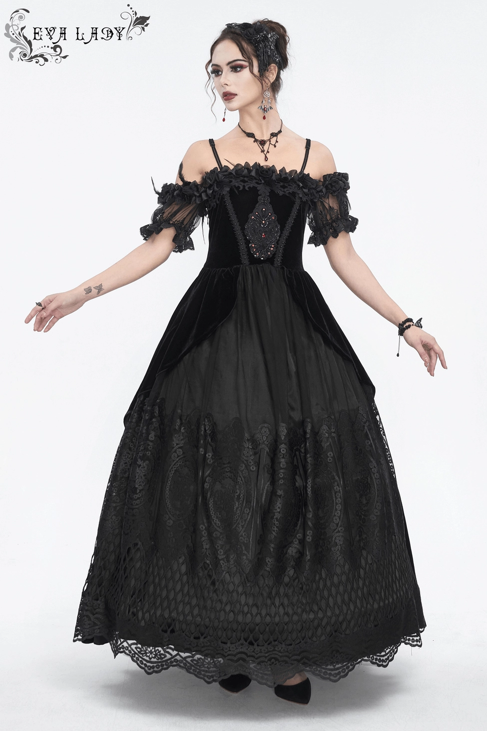 Black gothic off-shoulder formal dress on model - alternative fashion evening wear presentation