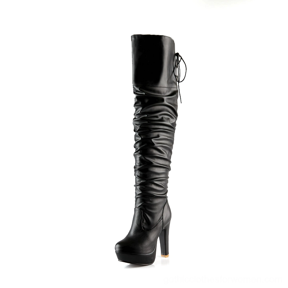 Black gothic over-the-knee boot with square block heel and ruched PU leather design, side profile view