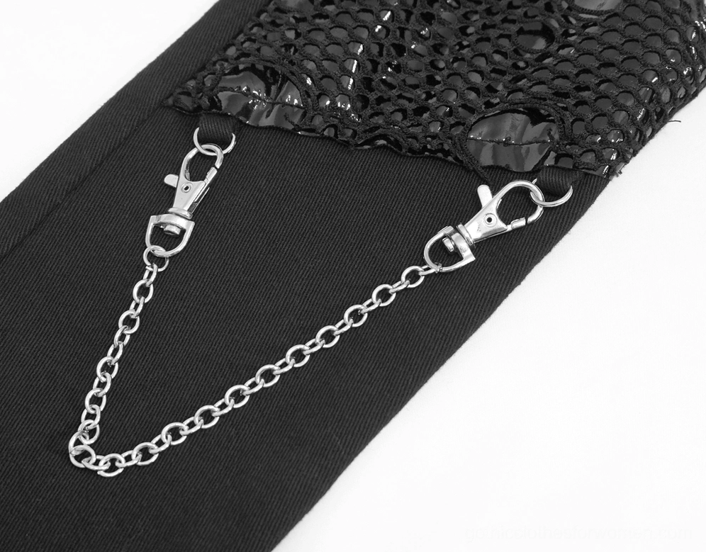 Double metal chain and lobster clasp detail on black gothic asymmetrical pants, hardware focus
