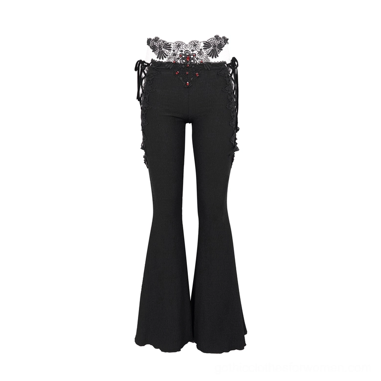 Flat lay of black lace-up flared gothic pants showcasing floral lace waist trim and silhouette