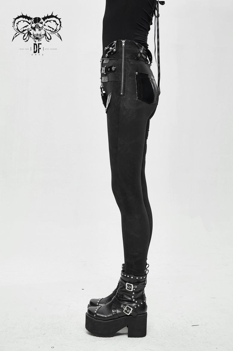 Front lower body detail of black gothic pentagram pants with vinyl pockets and leg strap accents