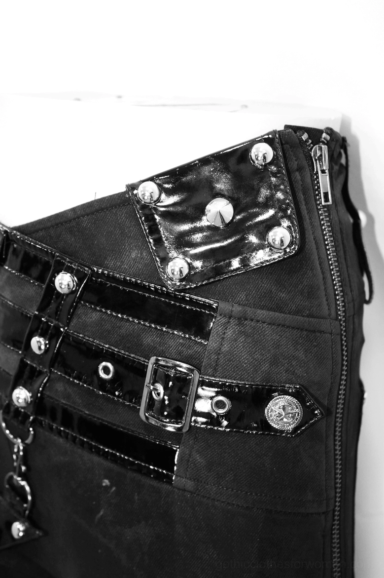 Black gothic pentagram harness pants showing vinyl pocket and metal stud hardware detail