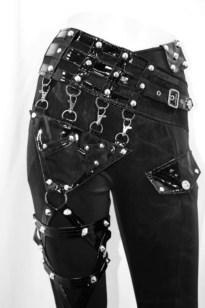 Vinyl pocket and metal rivet placement on black gothic pentagram harness pants