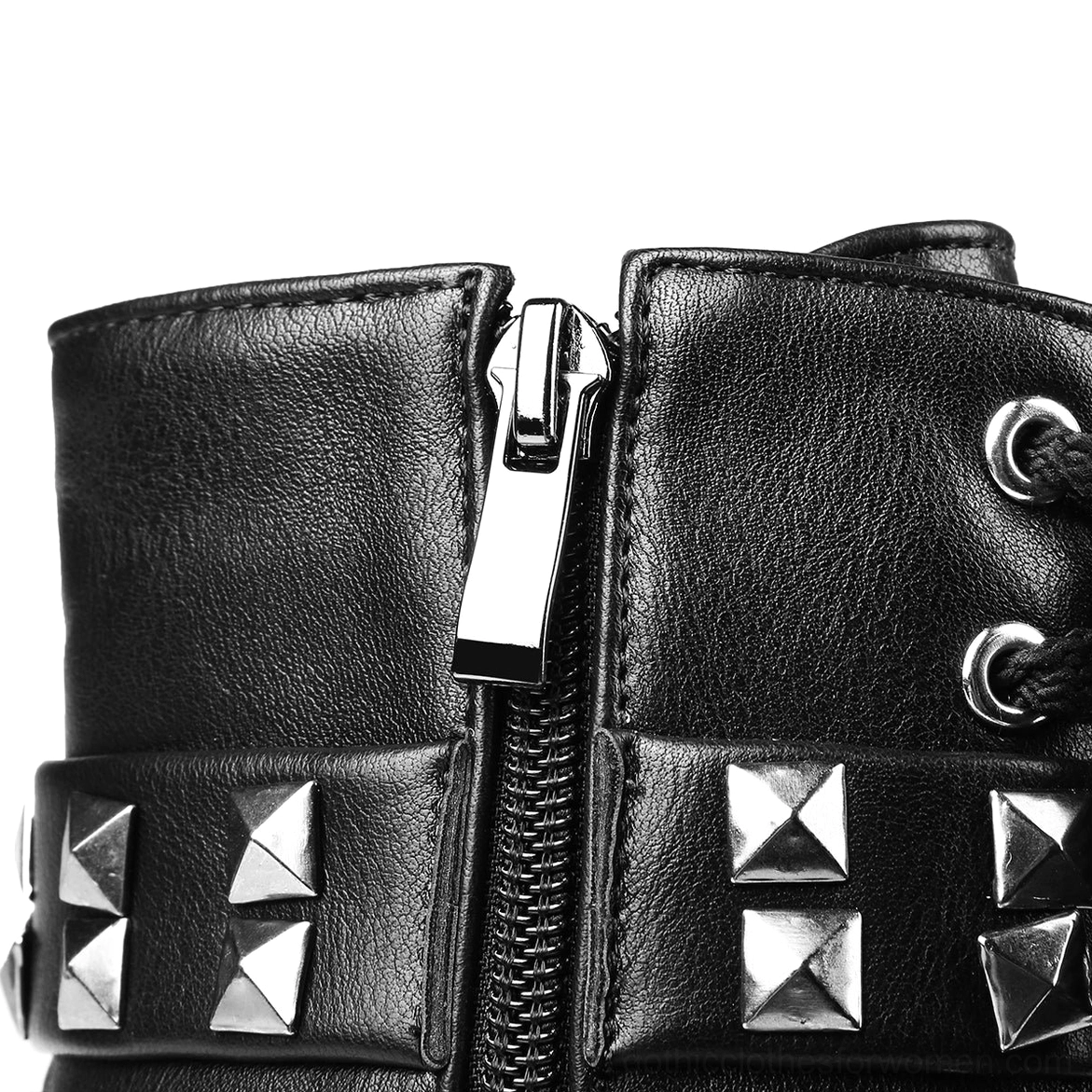 Black gothic platform combat boots detail shot emphasizing lace-up design and hardware elements