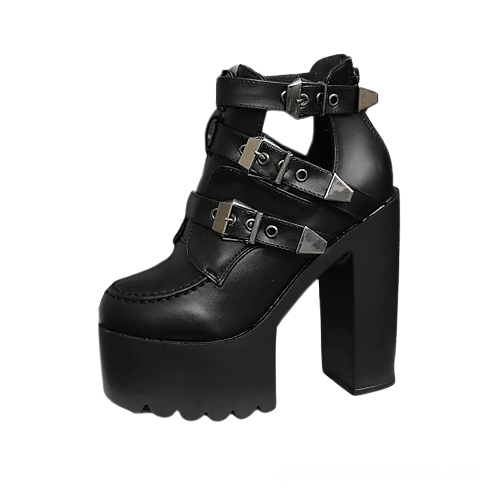 Black gothic platform ankle boots with multiple metal buckle straps, chunky block heel, and cutout ankle design - three-quarter left side view