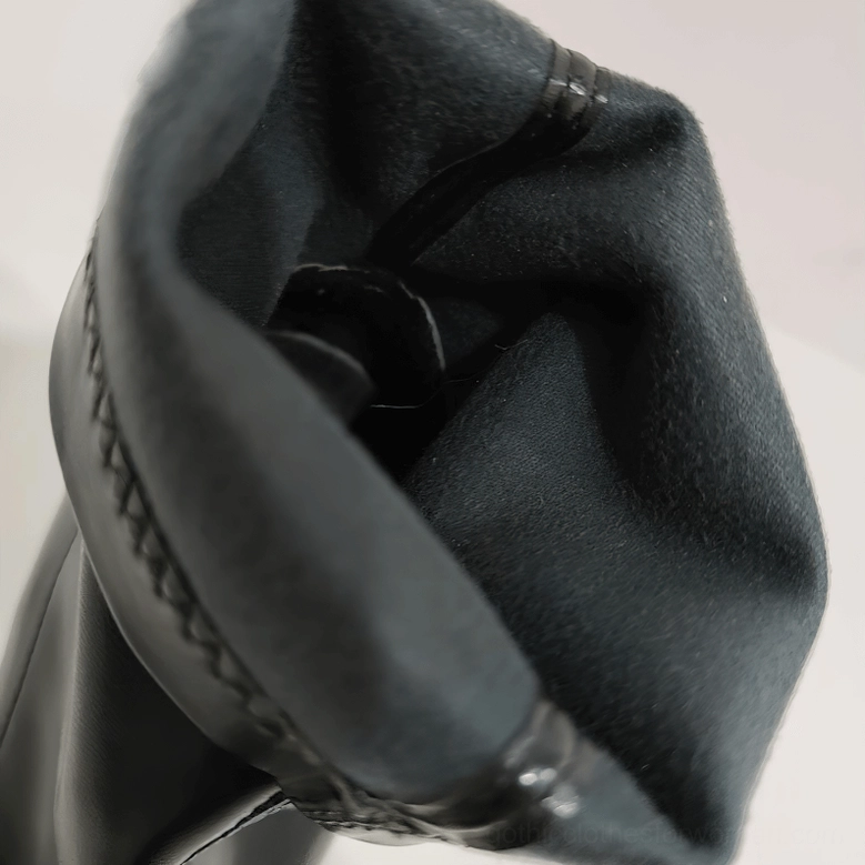 Black leather gothic platform boots three-quarter rear view displaying zip fastening and shaft height