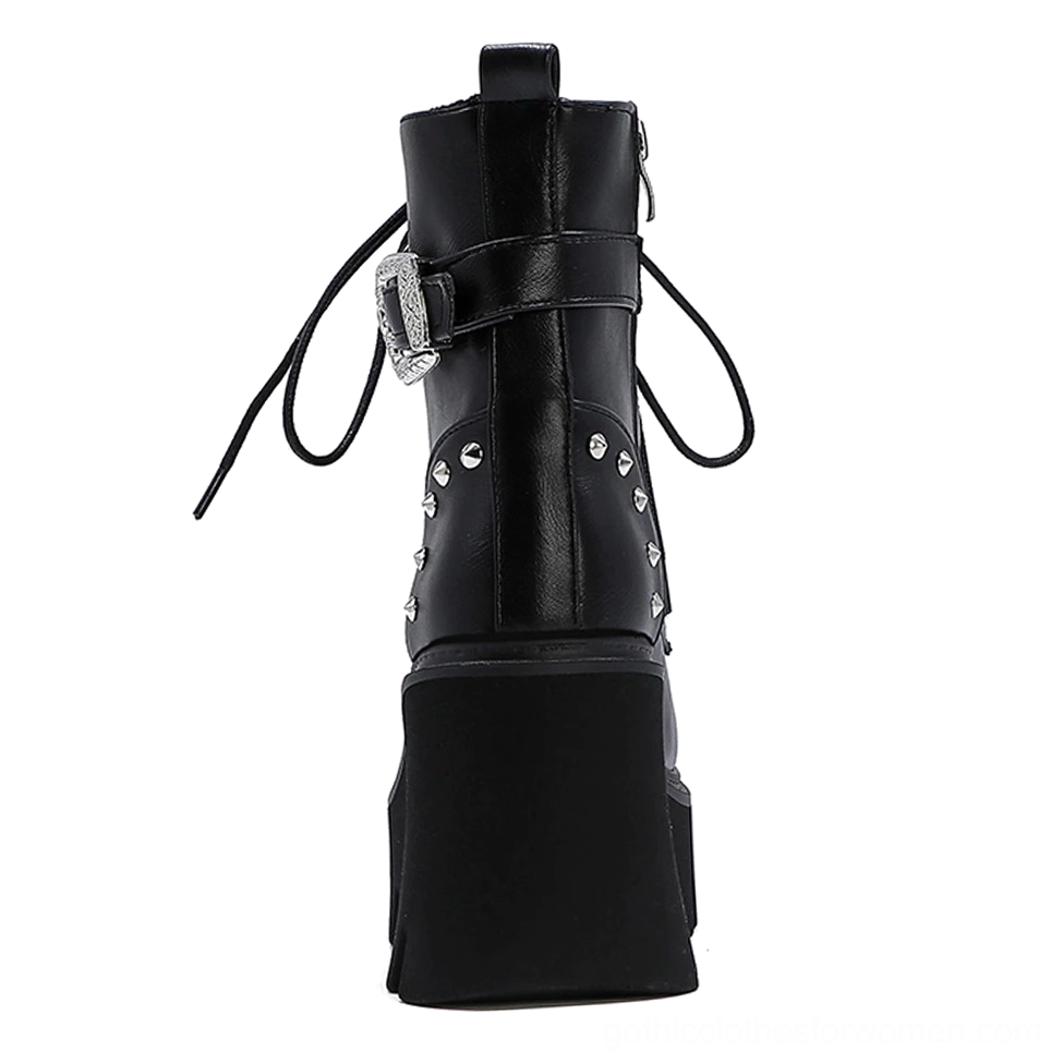 Single black gothic platform combat boot with side zipper and metal studs, rear angle view showing structural heel construction