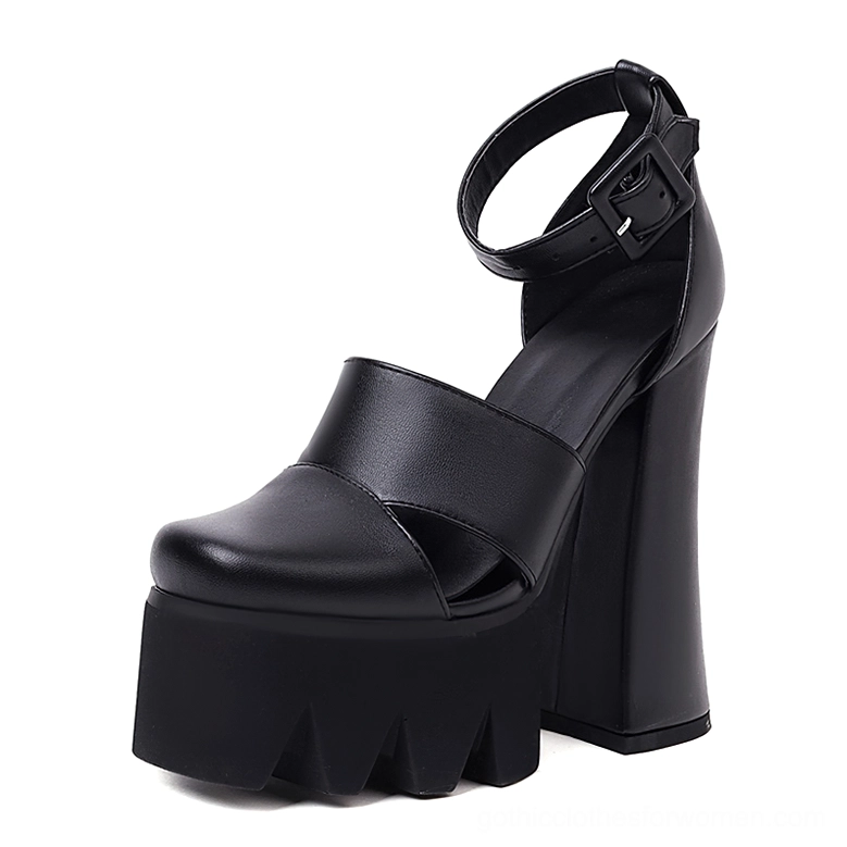 Black gothic platform ankle strap heels with chunky square heel and serrated platform sole, side front view showcasing 15cm heel height