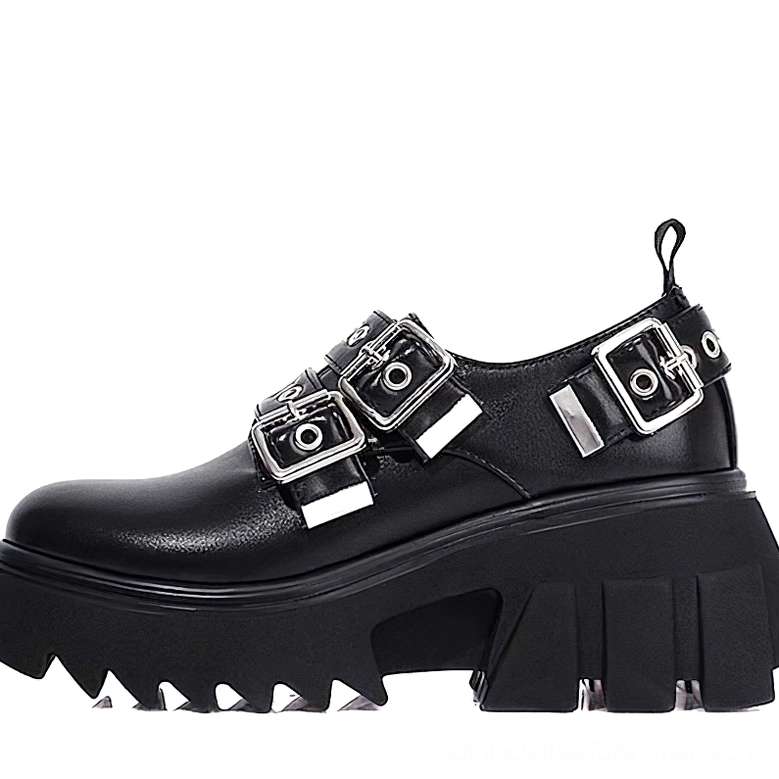 Women's gothic platform loafers right three-quarter angle, matte black leather upper with silver buckles and textured platform sole