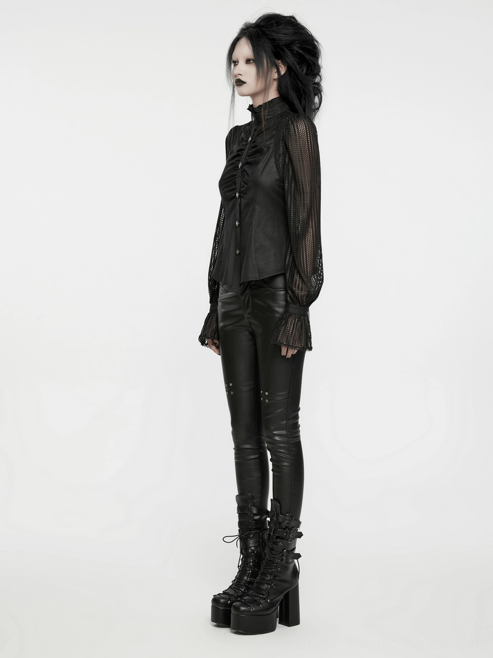 Black gothic pleated blouse texture detail showing quality of woven fabric bodice and hand-sewn embellishments