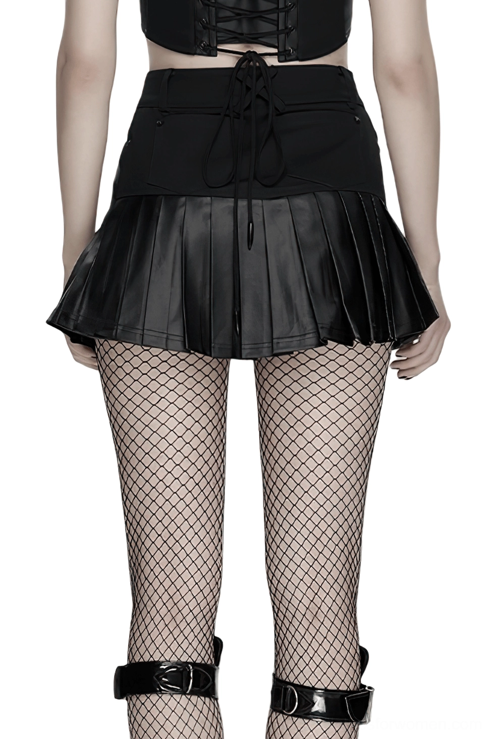 Black cyberpunk gothic skirt back view on model with lace-up back detail, cross strap, and pleated faux leather section, studio background