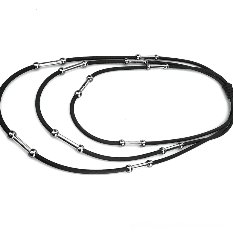 Black gothic rope necklace side view flat lay showing complete layered structure