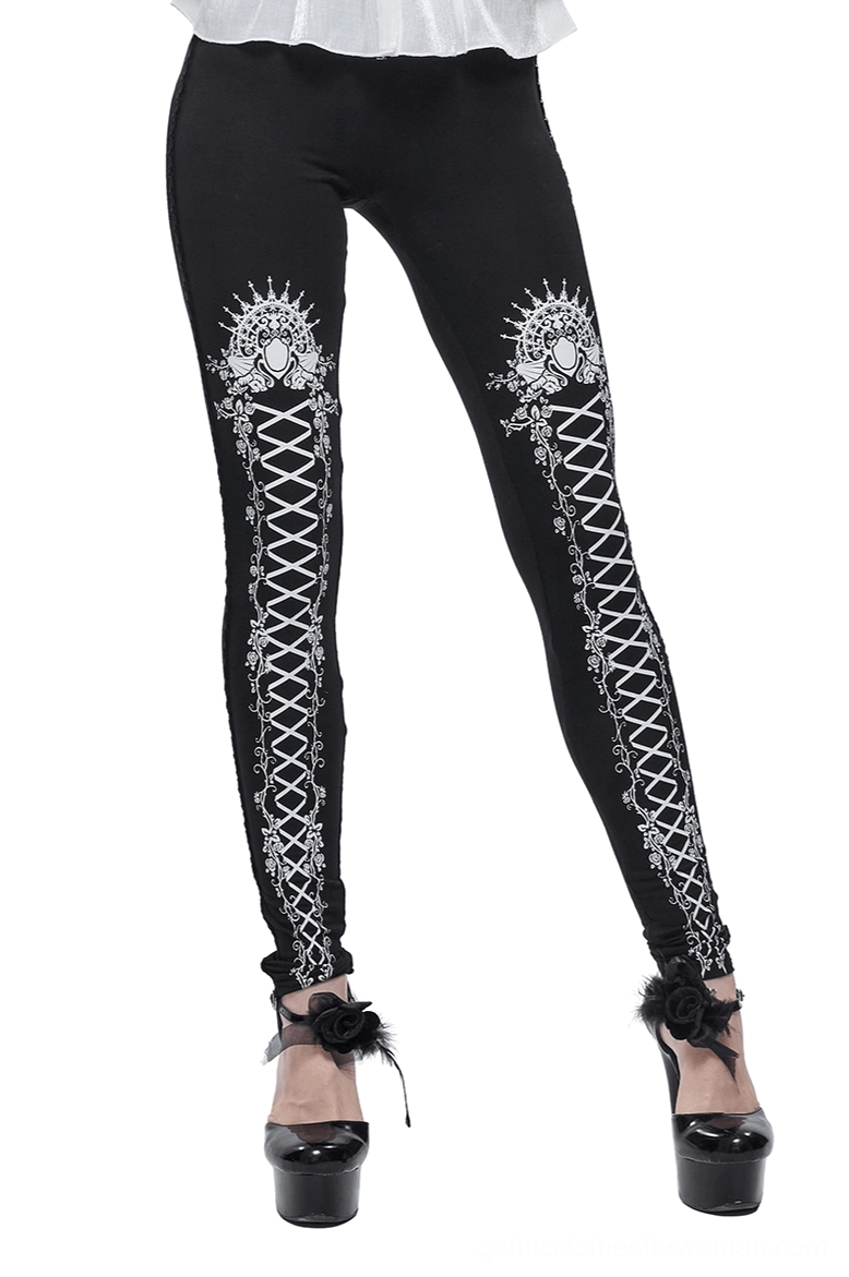 Black gothic rose lace-up leggings front full-body view on model with white ornamental print and embroidered waistband