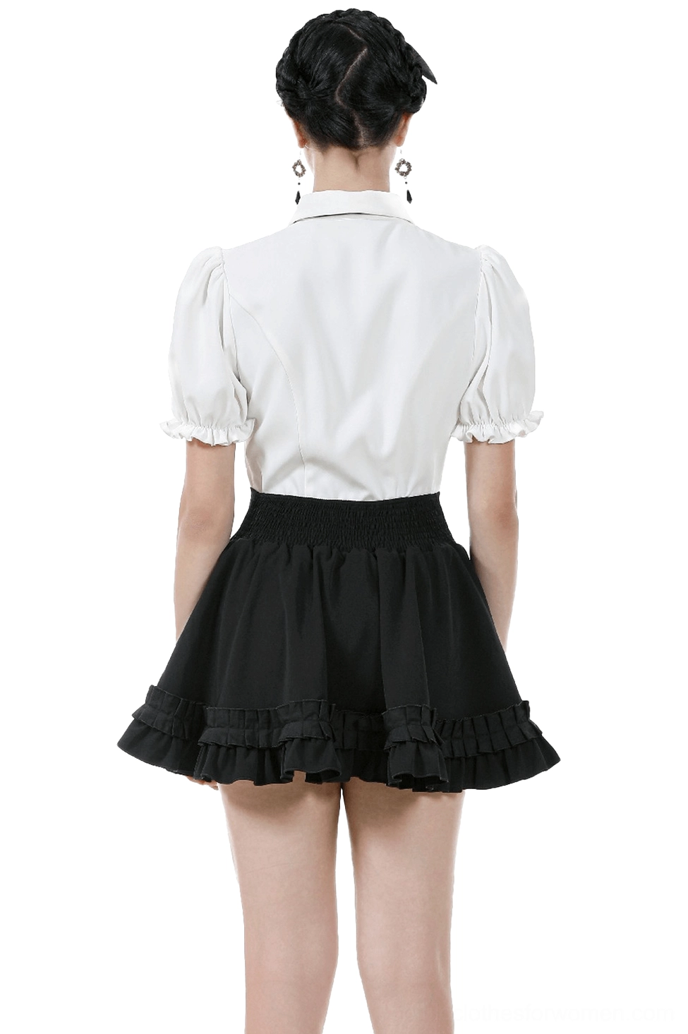 Black gothic ruffle mini skirt back view showing layered ruffles and smocked elastic waistband on model