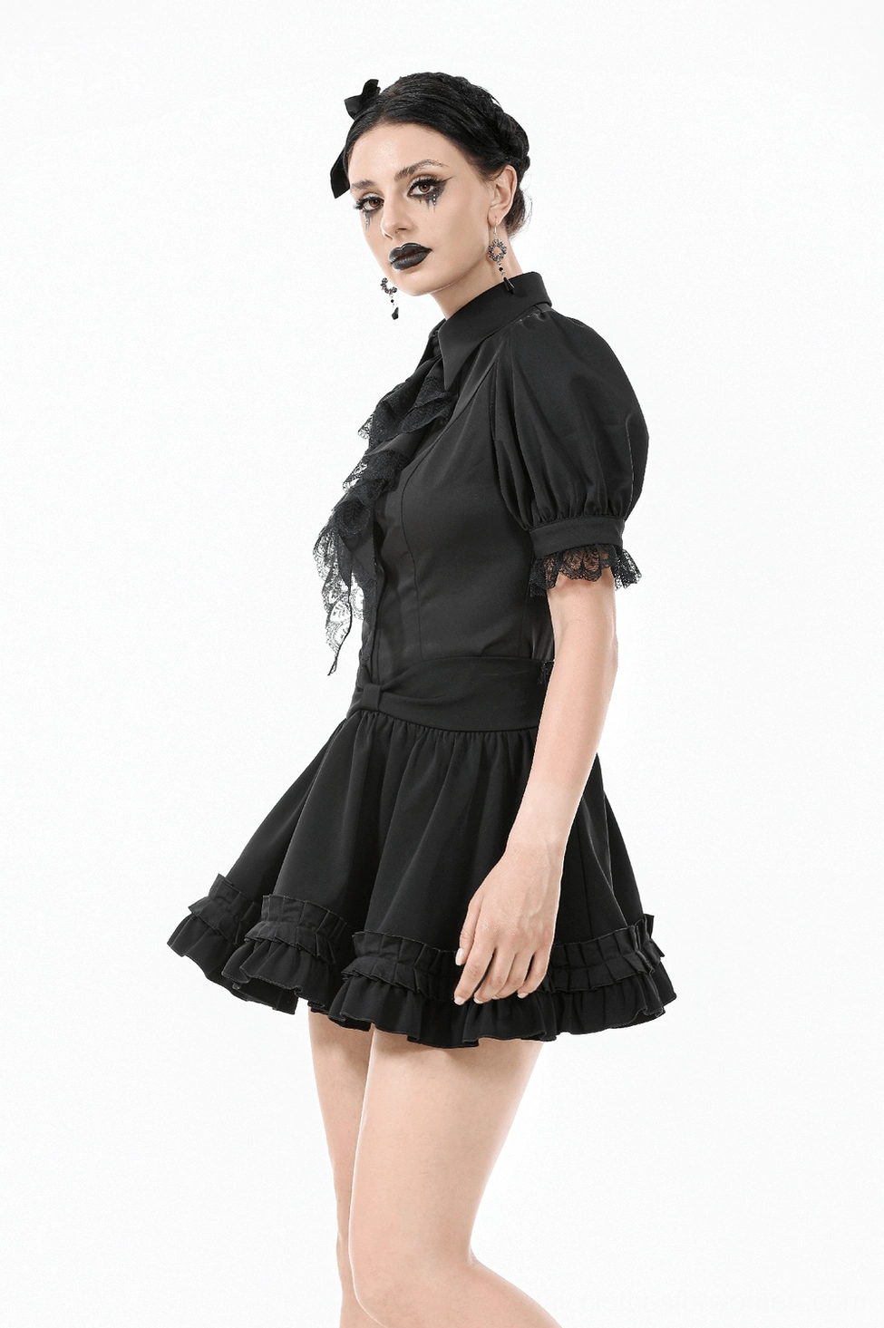 Black gothic ruffle mini skirt pleated detailing close-up view showcasing craftsmanship and fabric quality